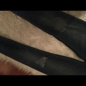 Mid waist ripped skinny jeans.